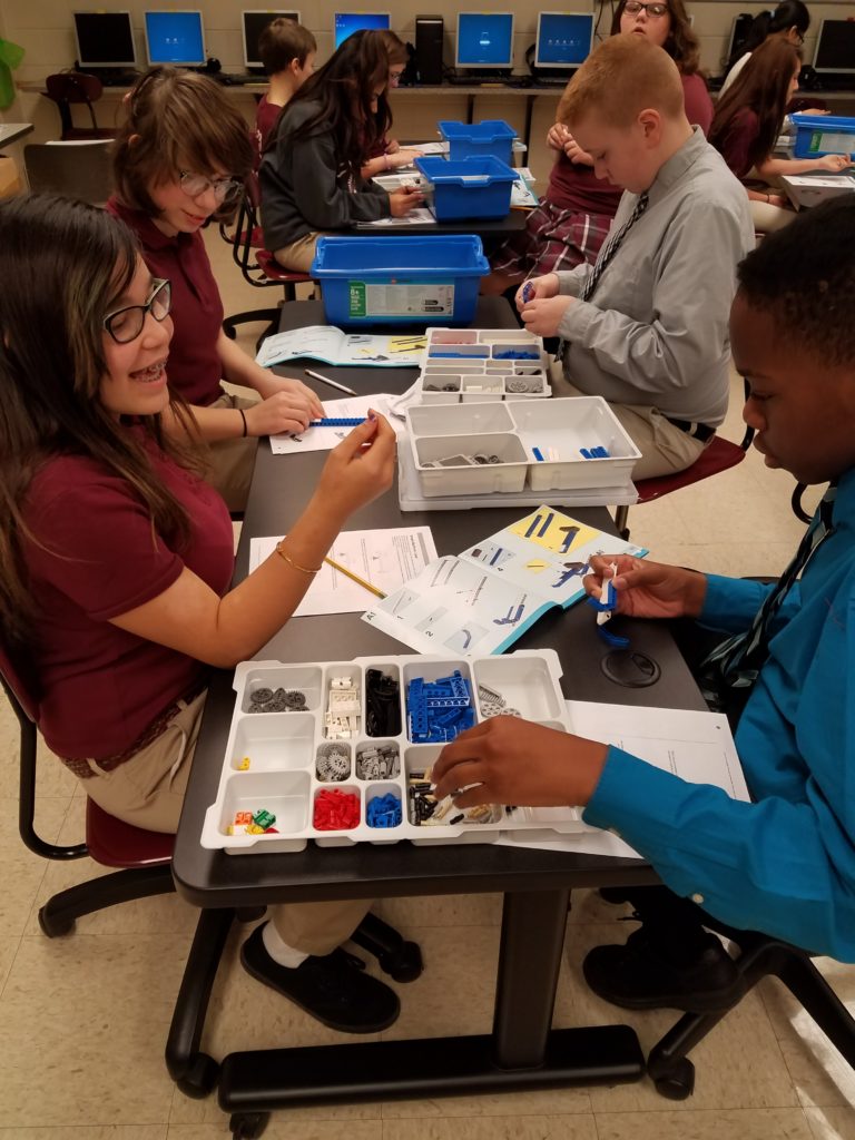 Students working with legos